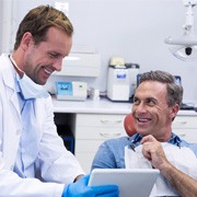 Man smiling at dentist